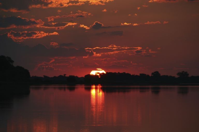 Visitors can enjoy a romantic sunset on the banks of the Thamalakane River. - See more at: https://www.themalaysianinsider.com/travel/article/5-spectacular-landscapes-in-botswana-2016s-must-visit-country#sthash.hAYwJjnG.dpuf